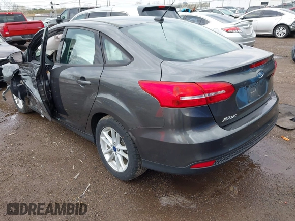 2018 Ford Focus SE with VIN 1FADP3F23JL280042, listed as a IAAI auction lot 41905008 with 80,797 mi miles. Bid and sale history available at carsss.com. Image 3.