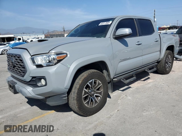 2020 Toyota Tacoma SR5 with VIN 3TMAZ5CN2LM137991, listed as a Copart auction lot 60317895 with 98,054 mi miles and Salvage title. Bid and sale history available at DreamBid. Image 1.
