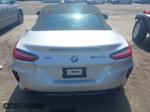 2021 BMW Z4 sDriveM40i z VIN WBAHF9C00MWX17614, wystawiony jako IAAI lot #42277354 z przebiegiem 26 615 mil mil oraz . Historia ofert i sprzedaży dostępna na DreamBid. Obrazek 15.