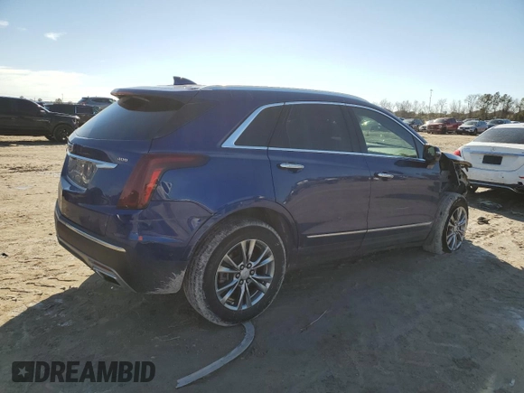 2023 Cadillac XT5 FWD Premium Luxury with VIN 1GYKNCRS3PZ154122, listed as a Copart auction lot 43063675 with 52,279 mi miles and Salvage Title. Bid and sale history available at carsss.com. Image 3.