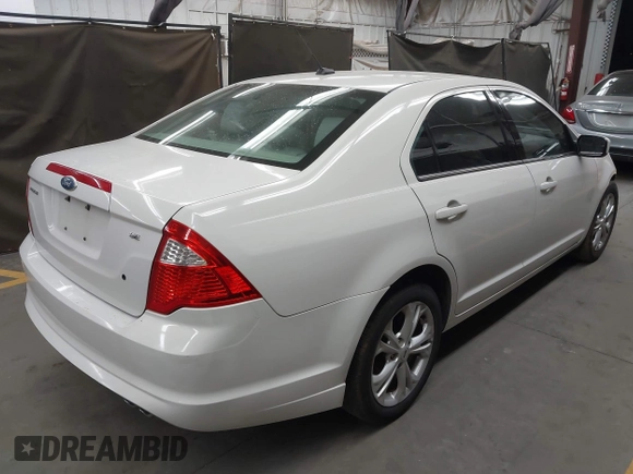 2012 Ford Fusion SE with VIN 3FAHP0HA4CR259743, listed as a IAAI auction lot 42058404 with 118,740 mi miles and . Bid and sale history available at DreamBid. Image 4.