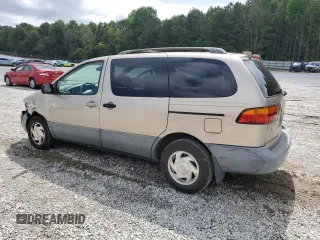 2000 Toyota Sienna LE z VIN 4T3ZF13C7YU259075, wystawiony jako Copart lot #58416105 z przebiegiem 235 788 mil mil oraz Szkoda całkowita • Salvage title. Historia ofert i sprzedaży dostępna na DreamBid. Obrazek 2.
