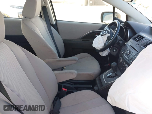 2013 Mazda 5 Sport with VIN JM1CW2BL4D0145725, listed as a IAAI auction lot 42190177 with 143,209 mi miles and . Bid and sale history available at DreamBid. Image 5.