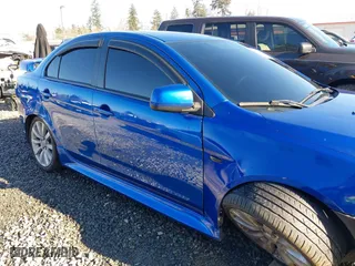 2011 Mitsubishi Lancer ES with VIN JA32U2FU8BU042901, listed as a IAAI auction lot 41450601 with 161,129 mi miles. Bid and sale history available at carsss.com. Image 13.
