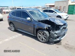 2017 BMW X1 xDrive28i with VIN WBXHT3Z31H4A56113, listed as a IAAI auction lot 42397932 with 70,252 mi miles and . Bid and sale history available at DreamBid. Image 1.