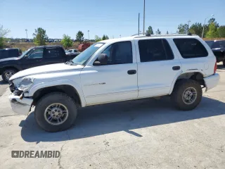 2000 Dodge Durango with VIN 1B4HS28ZXYF104402, listed as a Copart auction lot 51296975 with 297,998 mi miles and Salvage Title. Bid and sale history available at DreamBid. Image 1.