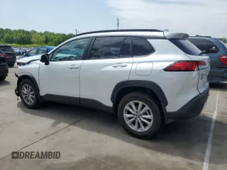 2023 Toyota Corolla Cross LE with VIN 7MUCAAAG2PV053730, listed as a Copart auction lot 54825035 with 33,313 mi miles and Salvage title. Bid and sale history available at DreamBid. Image 2.