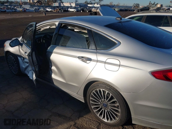 2017 Ford Fusion Hybrid Titanium with VIN 3FA6P0RU8HR190482, listed as a IAAI auction lot 41322244 with 137,539 mi miles and . Bid and sale history available at DreamBid. Image 17.