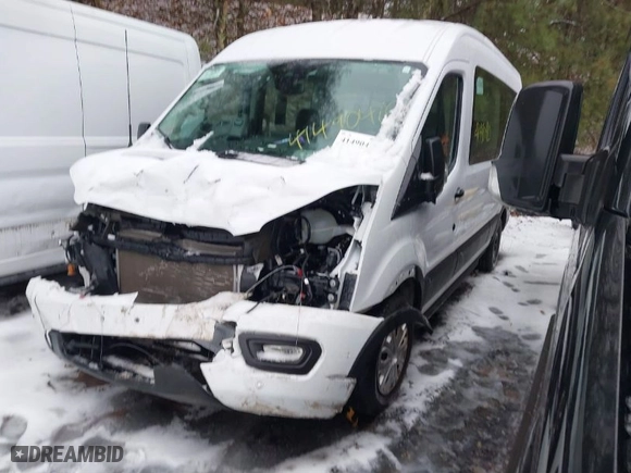 2022 Ford Transit Passenger Wagon XL with VIN 1FBAX2C88NKA79625, listed as a IAAI auction lot 41490410 with 27,521 mi miles. Bid and sale history available at carsss.com. Image 2.