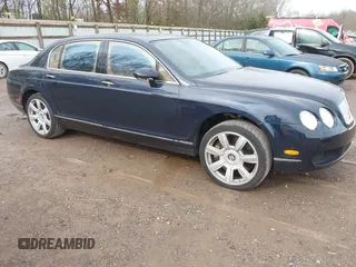 2006 Bentley Flying Spur z VIN SCBBR53W46C032889, wystawiony jako IAAI lot #41870488 z przebiegiem 105 087 mil mil oraz . Historia ofert i sprzedaży dostępna na DreamBid. Obrazek 1.