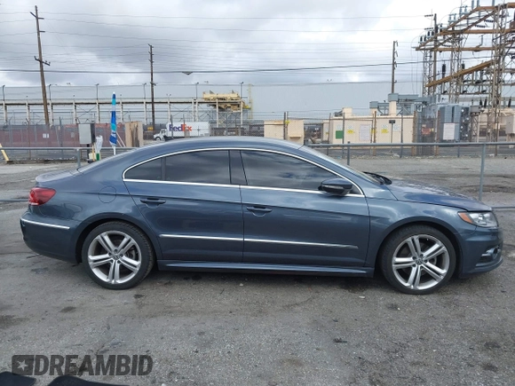 2013 Volkswagen CC Sport with VIN WVWBP7AN3DE571837, listed as a IAAI auction lot 41784447 with 156,834 mi miles. Bid and sale history available at carsss.com. Image 13.