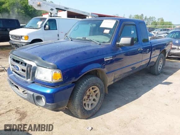 2011 Ford Ranger XLT with VIN 1FTLR4FE2BPA41799, listed as a IAAI auction lot 42390457 with 154,477 mi miles and . Bid and sale history available at DreamBid. Image 2.