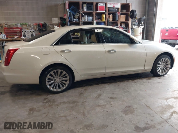 2014 Cadillac CTS Luxury AWD with VIN 1G6AX5S30E0181597, listed as a IAAI auction lot 41853975 with Not Provided miles and . Bid and sale history available at DreamBid. Image 13.