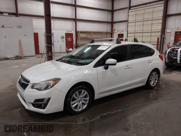 2015 Subaru Impreza Premium with VIN JF1GPAC64FH272292, listed as a IAAI auction lot 42189917 with 125,386 mi miles and . Bid and sale history available at DreamBid. Image 2.