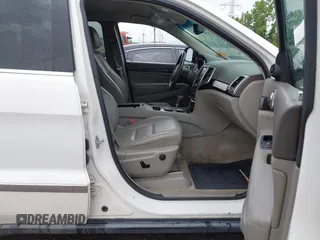 2011 Jeep Grand Cherokee Laredo z VIN 1J4RR4GG1BC572827, wystawiony jako IAAI lot #42313674 z przebiegiem 273 215 mil mil oraz . Historia ofert i sprzedaży dostępna na DreamBid. Obrazek 5.