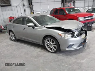 2014 Mazda 6 i Touring with VIN JM1GJ1T51E1106970, listed as a IAAI auction lot 42027350 with 113,756 mi miles and . Bid and sale history available at carsss.com. Image 1.