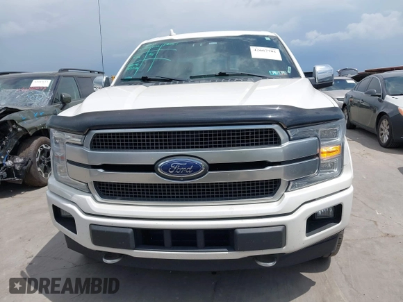 2018 Ford F-150 XL z VIN 1FTEW1EGXJFC60887, wystawiony jako IAAI lot #42667701 z przebiegiem 132 611 mil mil oraz . Historia ofert i sprzedaży dostępna na DreamBid. Obrazek 13.