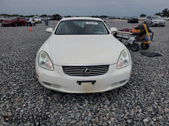 2003 Lexus SC 430 with VIN JTHFN48Y030045309, listed as a Copart auction lot 59034585 with 104,167 mi miles and Salvage title. Bid and sale history available at DreamBid. Image 5.