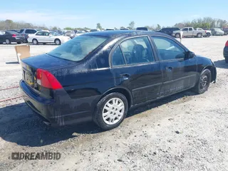 2004 Honda Civic LX with VIN 2HGES16554H505432, listed as a IAAI auction lot 41896813 with 152,685 mi miles. Bid and sale history available at carsss.com. Image 4.
