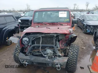 2007 Jeep Wrangler Unlimited Sahara with VIN 1J4GA59177L162022, listed as a IAAI auction lot 41887599 with 207,358 mi miles and . Bid and sale history available at DreamBid. Image 11.