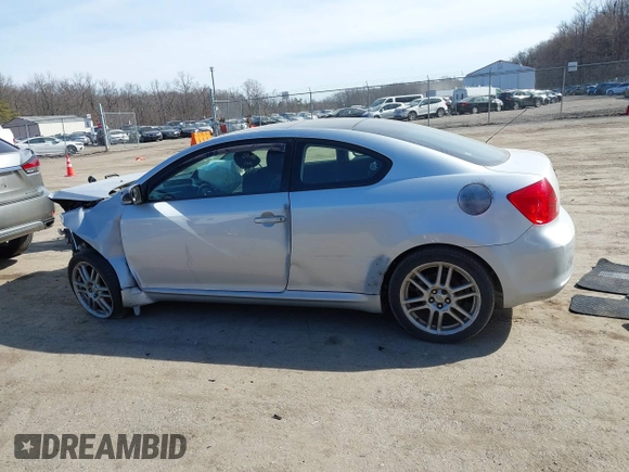 2005 Scion tC with VIN JTKDE177050043393, listed as a IAAI auction lot 41762368 with 170,244 mi miles. Bid and sale history available at carsss.com. Image 14.