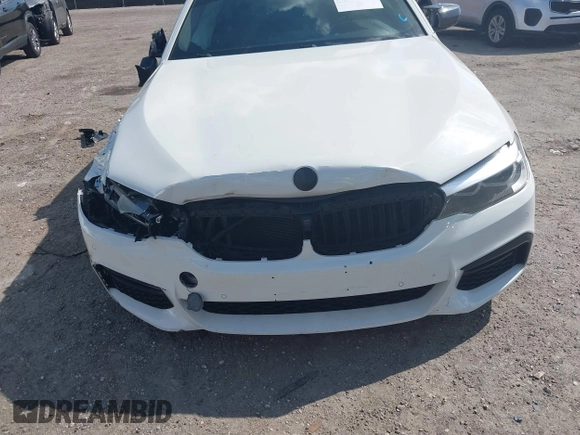 2018 BMW 5 Series 540i with VIN WBAJE5C50JWA95412, listed as a IAAI auction lot 41502258 with 74,150 mi miles and . Bid and sale history available at carsss.com. Image 6.