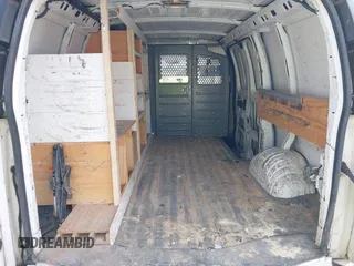 2012 Chevrolet Express Cargo with VIN 1GCWGFFA8C1106882, listed as a IAAI auction lot 42284350 with 227,443 mi miles and . Bid and sale history available at DreamBid. Image 17.