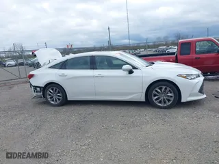 2022 Toyota Avalon Hybrid XLE with VIN 4T1AA1ABXNU015401, listed as a IAAI auction lot 41947755 with 52,867 mi miles. Bid and sale history available at carsss.com. Image 14.