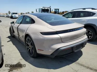 2024 Porsche Taycan z VIN WP0AA2Y1XRSA10095, wystawiony jako Copart lot #60040284 z przebiegiem 1 732 mil mil oraz Szkoda całkowita • Salvage title. Historia ofert i sprzedaży dostępna na DreamBid. Obrazek 2.