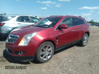 2011 Cadillac SRX Premium Collection with VIN 3GYFNCEY0BS609817, listed as a IAAI auction lot 39865672 with 114,665 mi miles. Bid and sale history available at carsss.com. Image 2.