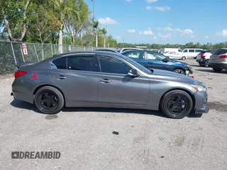 2014 Infiniti Q50 Sport with VIN JN1BV7AP4EM670443, listed as a IAAI auction lot 41801219 with 98,719 mi miles and . Bid and sale history available at DreamBid. Image 13.