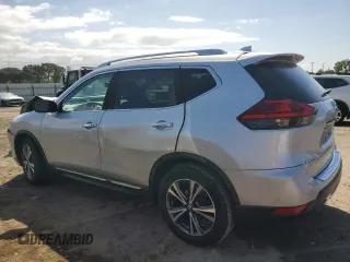 2017 Nissan Rogue SL z VIN 5N1AT2MT3HC885683, wystawiony jako Copart lot #54957275 z przebiegiem 127 879 mil mil oraz Szkoda całkowita • Salvage title. Historia ofert i sprzedaży dostępna na DreamBid. Obrazek 2.