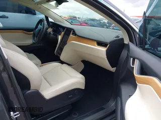 2018 Tesla Model X 75D with VIN 5YJXCBE29JF126629, listed as a IAAI auction lot 42205838 with 47,343 mi miles and . Bid and sale history available at DreamBid. Image 5.