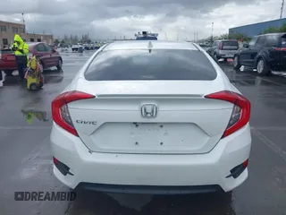 2017 Honda Civic EX-L z VIN 2HGFC1F79HH635156, wystawiony jako IAAI lot #41922115 z przebiegiem 142 565 mil mil oraz . Historia ofert i sprzedaży dostępna na DreamBid. Obrazek 16.