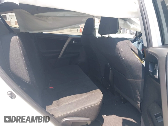 2018 Toyota RAV4 XLE z VIN 2T3WFREV1JW459553, wystawiony jako IAAI lot #42423474 z przebiegiem 129 523 mil mil oraz . Historia ofert i sprzedaży dostępna na DreamBid. Obrazek 8.