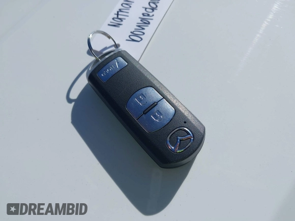 2018 Mazda 3 Touring with VIN 3MZBN1L34JM164952, listed as a IAAI auction lot 42179420 with 106,706 mi miles and . Bid and sale history available at DreamBid. Image 11.