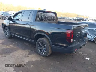 2024 Honda Ridgeline Sport with VIN 5FPYK3F14RB012334, listed as a IAAI auction lot 41542412 with 1,817 mi miles and . Bid and sale history available at DreamBid. Image 3.
