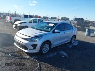 2023 Kia Rio LX with VIN 3KPA24ADXPE606463, listed as a IAAI auction lot 41728523 with 8,909 mi miles and . Bid and sale history available at DreamBid. Image 18.