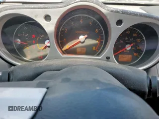 2006 Nissan 350Z Touring z VIN JN1AZ36A36M450869, wystawiony jako Copart lot #59898195 z przebiegiem 160 031 mil mil oraz Czysty tytuł • Clean title. Historia ofert i sprzedaży dostępna na DreamBid. Obrazek 9.