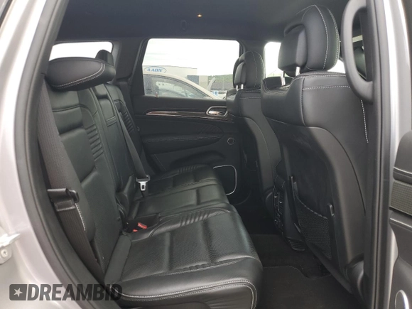 2018 Jeep Grand Cherokee Trackhawk with VIN 1C4RJFN91JC223825, listed as a Copart auction lot 58011465 with 83,177 mi miles and Salvage title. Bid and sale history available at DreamBid. Image 11.