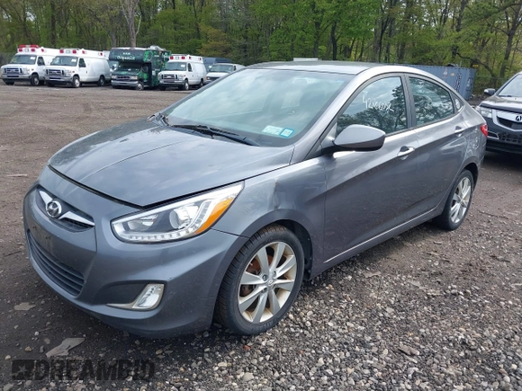 2014 Hyundai Accent GLS with VIN KMHCU4AE9EU761298, listed as a IAAI auction lot 42186032 with 118,848 mi miles and . Bid and sale history available at carsss.com. Image 2.