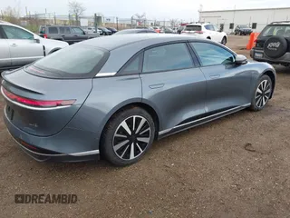 2023 Lucid Air Pure with VIN 50EA1PFA5PA007794, listed as a IAAI auction lot 42113156 with 5,052 mi miles. Bid and sale history available at carsss.com. Image 4.