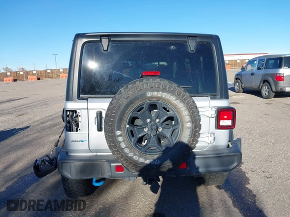 2023 Jeep Wrangler z VIN 1C4JJXN62PW628429, wystawiony jako IAAI lot #40861135 z przebiegiem 33 923 mil mil oraz . Historia ofert i sprzedaży dostępna na DreamBid. Obrazek 16.