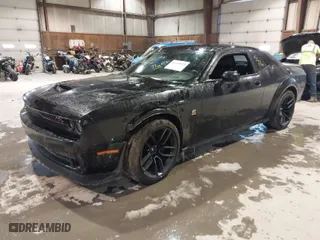 2019 Dodge Challenger R/T Scat Pack with VIN 2C3CDZFJ4KH671633, listed as a IAAI auction lot 41140929 with 45,988 mi miles. Bid and sale history available at carsss.com. Image 2.