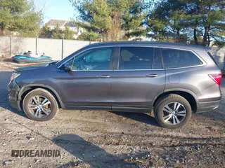 2017 Honda Pilot EX-L z VIN 5FNYF6H70HB069712, wystawiony jako IAAI lot #41828893 z przebiegiem 70 061 mil mil oraz . Historia ofert i sprzedaży dostępna na DreamBid. Obrazek 14.