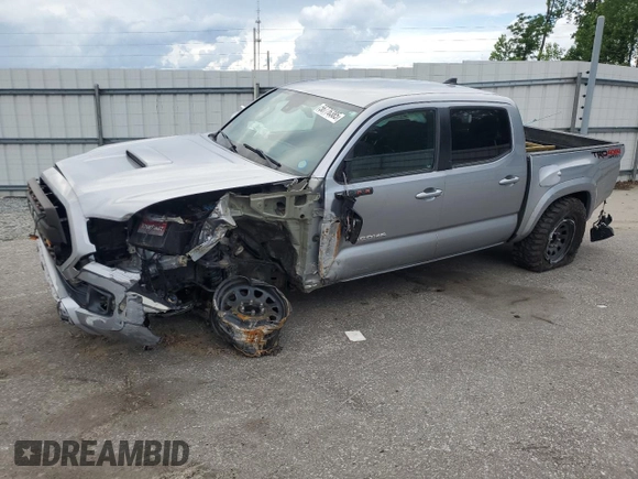 2019 Toyota Tacoma SR with VIN 3TMCZ5AN2KM193701, listed as a Copart auction lot 56776385 with 112,990 mi miles and Salvage title. Bid and sale history available at DreamBid. Image 1.