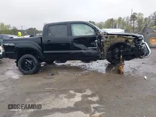 2015 Toyota Tacoma with VIN 3TMLU4EN9FM181683, listed as a IAAI auction lot 41980940 with 176,523 mi miles and . Bid and sale history available at DreamBid. Image 13.