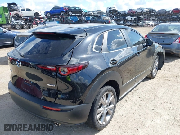 2021 Mazda CX-30 Select z VIN 3MVDMABL1MM251761, wystawiony jako IAAI lot #42267217 z przebiegiem 42 617 mil mil oraz . Historia ofert i sprzedaży dostępna na DreamBid. Obrazek 4.