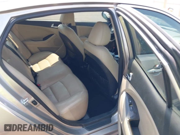 2015 Kia Optima EX with VIN 5XXGN4A75FG444341, listed as a IAAI auction lot 42738557 with 140,714 mi miles and . Bid and sale history available at DreamBid. Image 8.