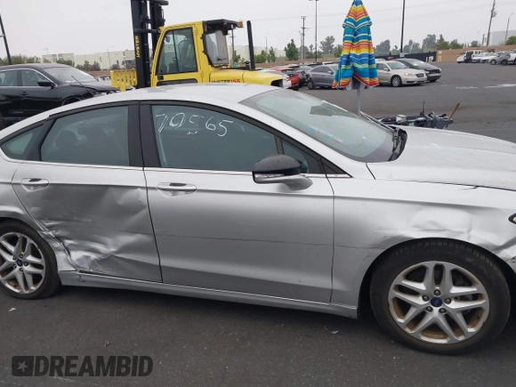 2016 Ford Fusion SE z VIN 3FA6P0H73GR144942, wystawiony jako IAAI lot #42770565 z przebiegiem 42 986 mil mil oraz . Historia ofert i sprzedaży dostępna na DreamBid. Obrazek 13.